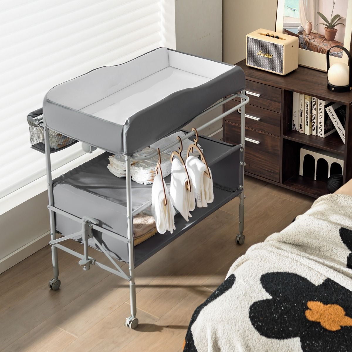 Folding Nursery Changing Table with Lockable Wheels and Storage Basket